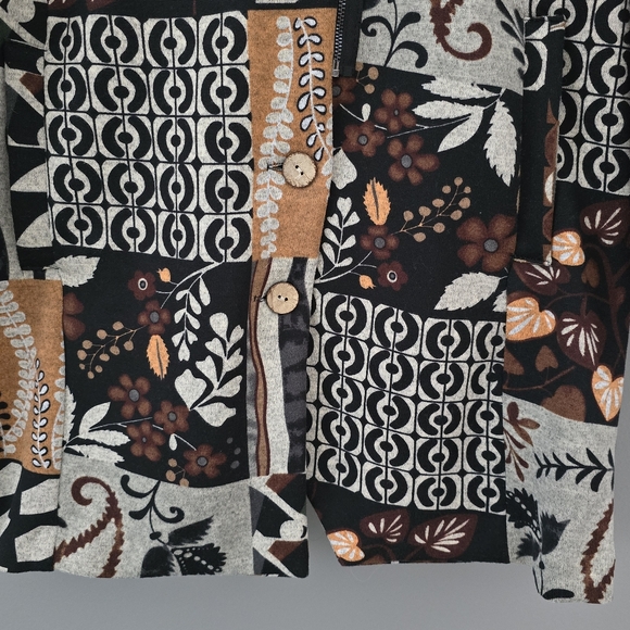 Long-sleeve, hooded asymmetrical zip-up jacket.  Patchwork design. - Picture 6 of 8